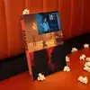 yearbook fro 18 frames in cinema with scattered popcorn